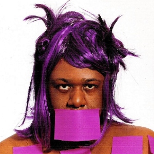 Artist Deborah Williams with purple sticky notes on her body