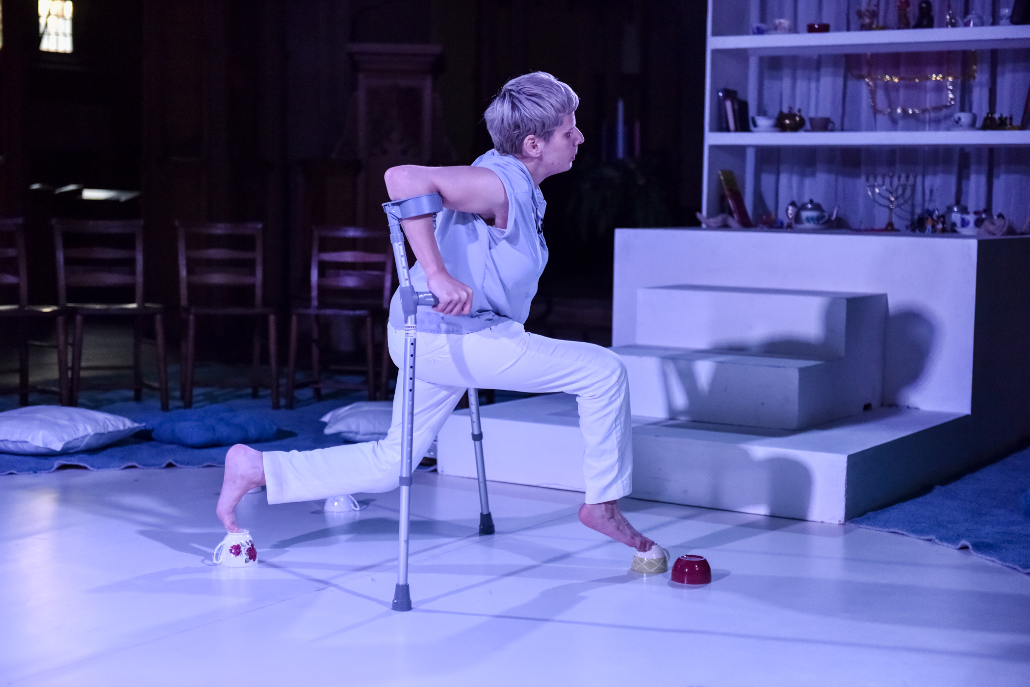 woman stretched out on crutches